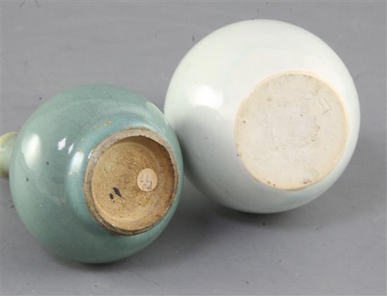 A Chinese Qingbai style bottle vase and a small Jun type green glazed bottle vase, possibly 17th / 18th century, height 11.7cm and 9.7
